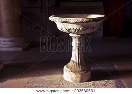 Inlaid Marble Holy Water Font In An Italian Church (italy) - Image With Copy Space