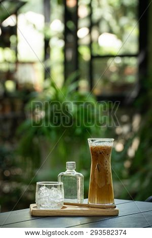 Ice Coffee In Decoation Glass On Wooden Table.