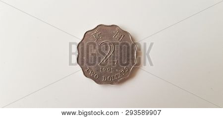 Two Hong Kong Dollars Coin View From Above Isolated On White Table