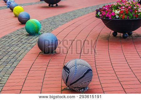 Timisoara, Romania - June 10, 2017: Street Decorations On A Street Pavement With Tramlines. Ornament