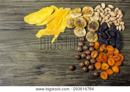 Mixed Dried Fruits. Symbols Of The Jewish Holiday Tu Bishvat. Figs, Dried Apricots, Prunes, Nuts, Al
