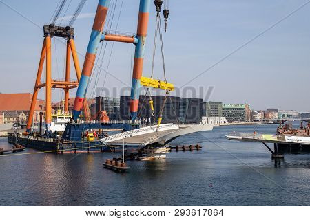 Copenhagen, Denmark - April 4, 2019: The Huge Floating Crane Hebo Lift 9 Installing Parts For A New 