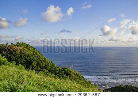 Paragliding Hill Watugupit At Yogyakarta, Beautiful View Of Hill And Sea With Blue Sky And Clouds