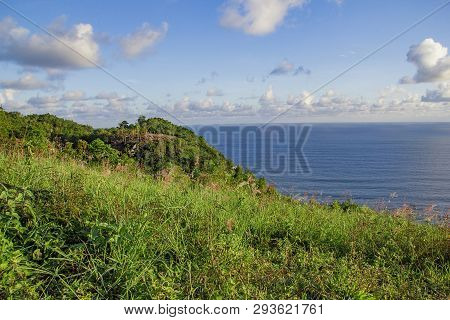 Paragliding Hill Watugupit At Yogyakarta, Beautiful View Of Hill And Sea With Blue Sky And Clouds