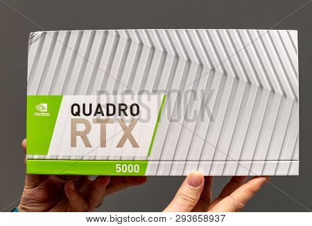 Paris France - Mar 28 2019: Senior Man Showing Cardboard Boxes Before Unboxing Of Nvidia Quadro Rtx 