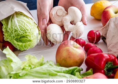 Women's Hands Lay Out Eco Vegan Products