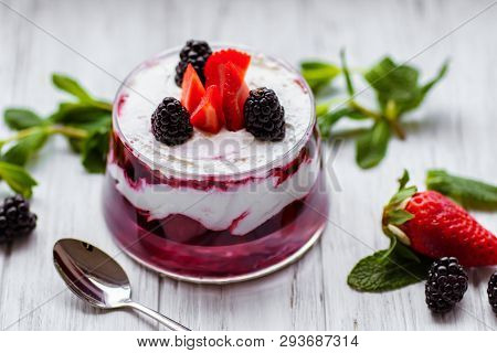Seasonal Fresh Layered Dessert Trifle. Homemade No Bake Cold Treat, Mousse, Pudding, Sponge Cake, Ri