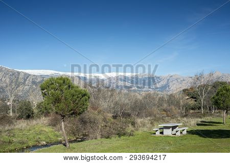Recreational Area Next To The Fuentiduena Stream On Its Way Through The City Of Cerceda, In The Prov