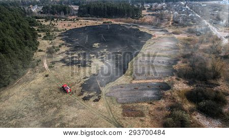 Aerial Drone View Of A Wildfire In A Grass And Forested Area