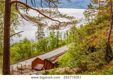 Staircase To Walk Up To Svandalsfossen In Norway, Waterfall In Norwegian Mountains. National Tourist