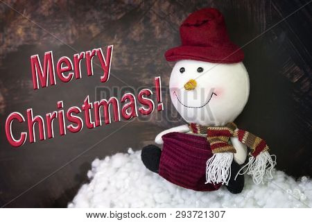 Christmas Card With Snowman On Brown Background With Inscription Merry Christmas