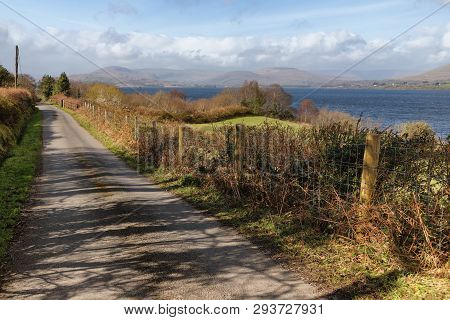 Mountain, Road, Lake And Vegetation At Western Way Trail In Lough Corrib