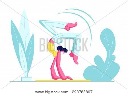 Young Woman In Sportswear Doing Yoga Or Pilates Exercise Keeping Balance Standing On Hands In Scorpi
