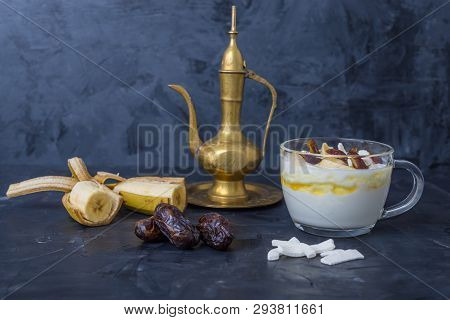 Iftar Or Suhoor Snack Close Up Of Dates With Yogurt And Bananas Honey And Dates  On Black Background