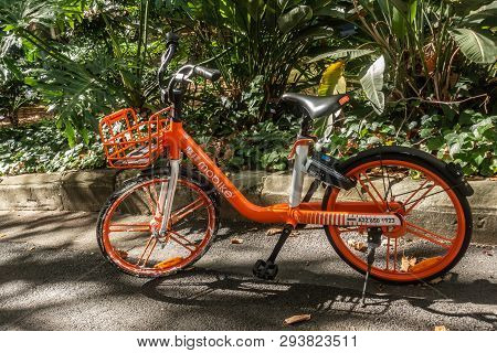 Sydney, Australia - February 12, 2019: Closeup Of Parked Orange Mobike Bicycle For Rent As Seen In L