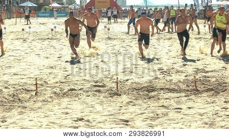 Mooloolaba, Queensland, Australia- April 22, 2016: Boys Surf Life Saving Beach Flags Race