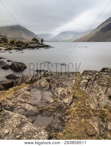 Beautiful Long Exposure Landscape Image Of Wast Water In Uk Lake District During Moody Spring Evenin