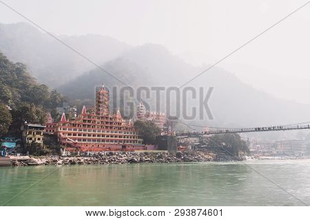 Rishikesh India. 10 January 2018. Unidentified People Crossing Laxman Jhula Footbridge On River Gang