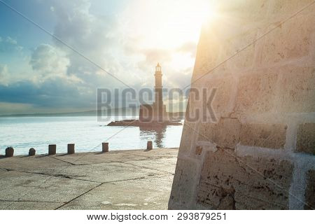 The Lighthouse And Fortress Firkas In Old Port Of Chania, Crete, Greece