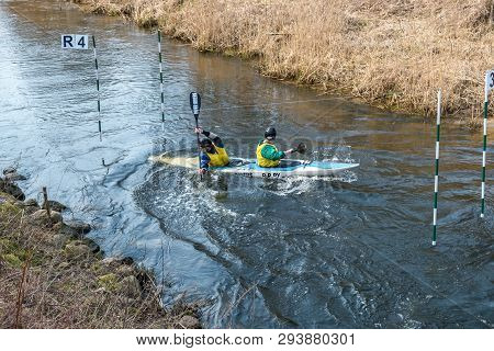 Grodno, Belarus - April, 2019: Kayak Freestyle Competition On Fast Cold Water River Strenuously Rowi