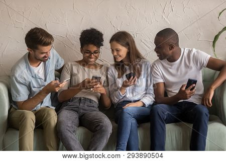 Happy Diverse Friends Group Sharing Social Media News Holding Phones