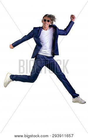 Confident Smart Looking Man Laughing And Jumping Up, Enjoying His Success - Wearing Siut, Isolated O