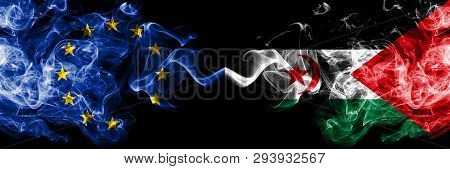 European Union Vs Sahrawi Smoke Flags Placed Side By Side. Thick Colored Silky Smoke Flags Of Eu And