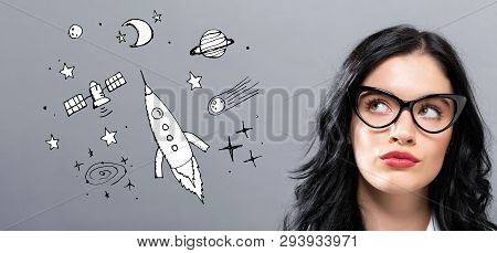 Dream Of Sapace And Rocket With Young Businesswoman In A Thoughtful Face