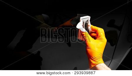 Car Polish Wax Worker Hands Polishing Car. Buffing And Polishing Vehicle With Ceramic. Car Detailing