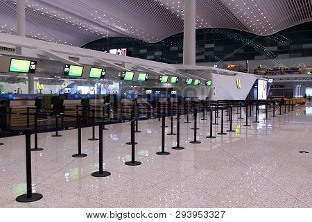 Guangzhou, China - Mart 10, 2019: Empty Check-in Counters In Guangzhou Baiyun International Airport.