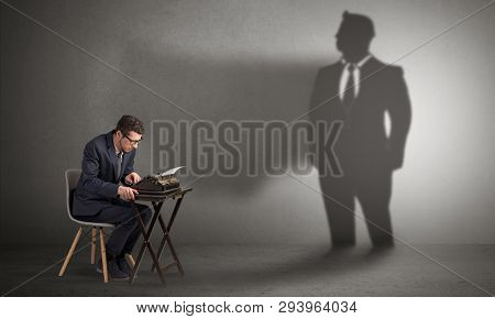 Shadow threatening hard worker man who is afraid