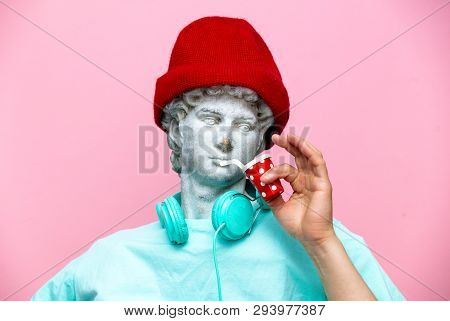 Antique Bust Of Male In Hat With Cola Drink On Pink Background. Ready For Summer Vacation
