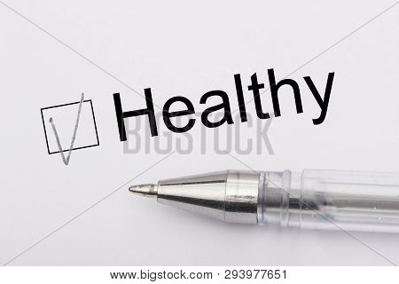 Healthy - Checkbox With A Cross On White Paper With Pen. Checklist Concept.