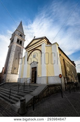 Vrsar, Croatia - May 22, 2018: View On Old Parish Church Of St. Martin And Bell Tower In The Orsera 