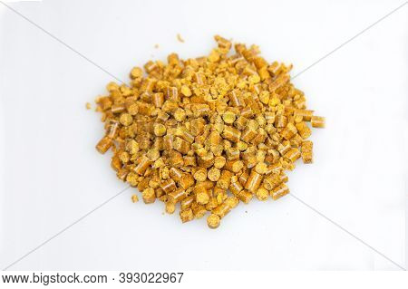 Pelletized Corn Gluten Meal Used In Natural Lawn Care As A Pre-emergent To Prevent Weed Seeds From G