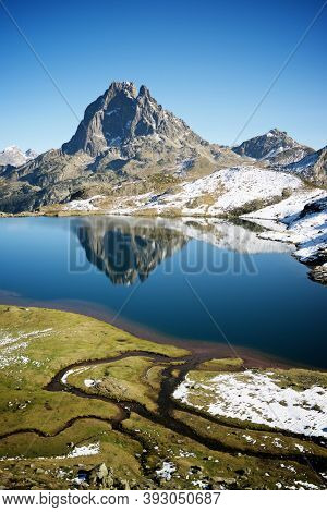 Midi Dossau Peak and Gentau lake. Ayous Lakes in Ossau Valley, Pyrenees National Park in France.