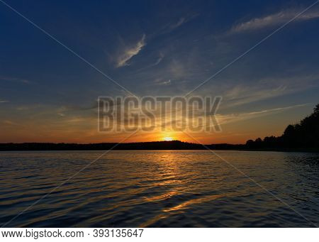 Beautiful Sunset Into Nature At Dabelow Sea In Mecklenburg-west Pomerania Germany