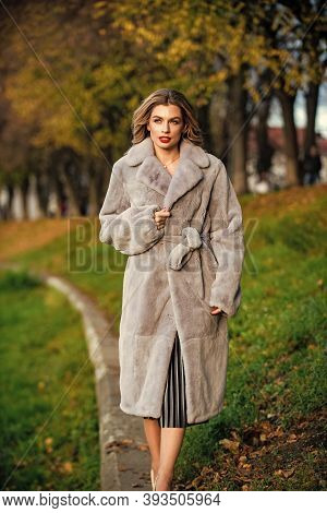 Foolproof Party Glamour. Lady Looking Trendy Walk In Street. Comfortable And Warm. Complement Your O