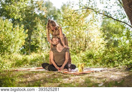 Beauty Treatment. Masseur Doing Massage On Woman Body In The Calm Outdoors.