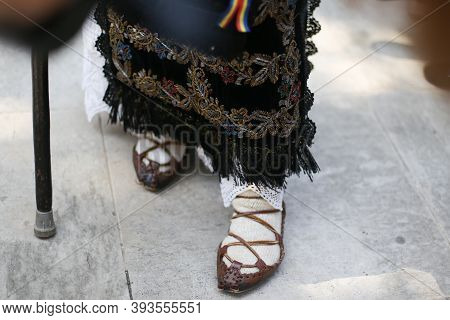 Shallow Depth Of Field (selective Focus) Image With Romanian Traditional Peasant Shoes (opinci) In T