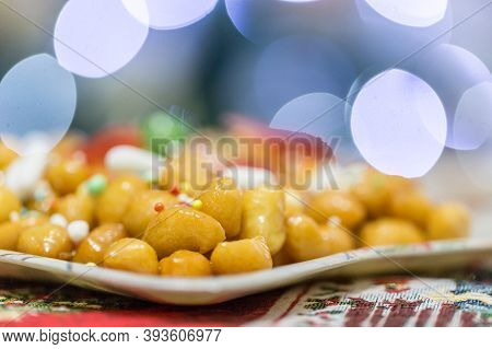 Homemade Sweet Italian Struffoli, Shortcrust Balls Fried And Dipped In Honey With Sprinkles. Typical