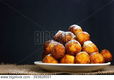 Festive Homemade Donuts For Hanukkah In Rustic Style On A Dark Background.