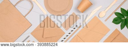 Banner With Flat Lay Composition With Eco-friendly Tableware - Set Of Kraft Paper Packaging On Light
