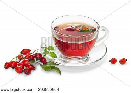 Cup Of Tea With Wild Rose And Green Leaves Isolated On White Background