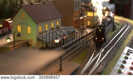 Replica Model Of Railway Station. Coming Lokomotive Train.