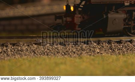 Close-up Kokomotive Train. Retro Railway And Train Head On Railroad.