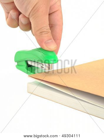 Stapler close up. Office concept. Stapler paper and thumb