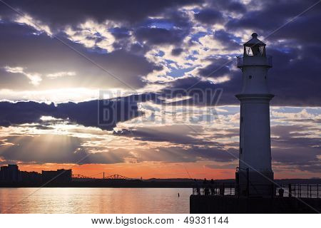 Lighthouse At Sunset