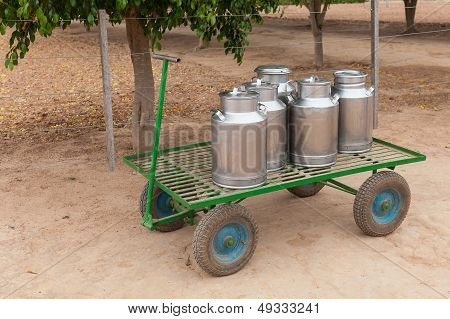 Milk cans on a cart