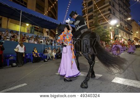 bailarina de flamenco español y un caballo
